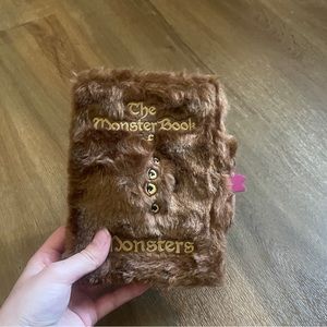 Harry Potter Universal Studios The Monster Book of Monsters notebook never used!
